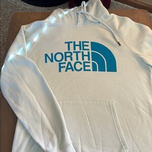 The North Light Blue Hoodie with Blue Logo
Size Small